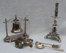 A white metal desk bell, together with a white metal table centrepiece silver toasting fork,