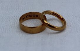 Two 22ct yellow gold wedding bands,