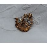 A 9ct yellow gold brooch in the form of a sailing ship, set with diamonds, approximately 5 grams,