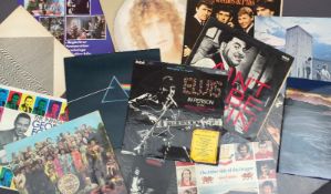 A collection of LP's, singles and 78 records, artists include The Beatles white album No.