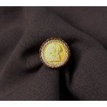 A Victorian gold half sovereign in a 9ct yellow gold ring mount,