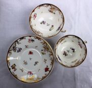 A trio of Rockingham porcelain breakfast cup, teacup and saucer,