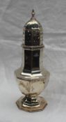 An Elizabeth II silver sugar caster, of panelled baluster form on a spreading foot, Sheffield, 1958,
