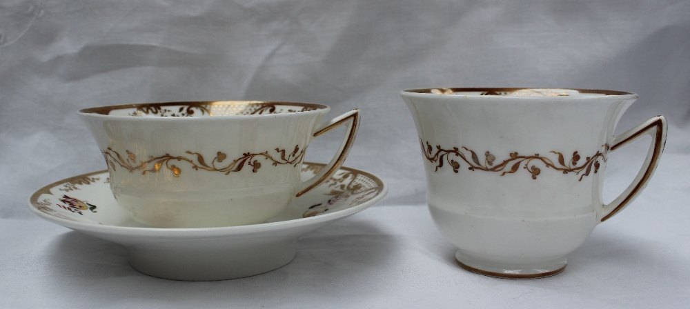 A trio of Rockingham porcelain breakfast cup, teacup and saucer, - Image 2 of 4