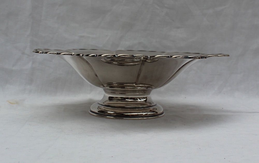 A George V silver pedestal bowl, of lobed form on a pedestal foot, Birmingham, 1944,