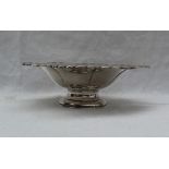 A George V silver pedestal bowl, of lobed form on a pedestal foot, Birmingham, 1944,