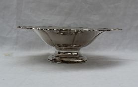 A George V silver pedestal bowl, of lobed form on a pedestal foot, Birmingham, 1944,