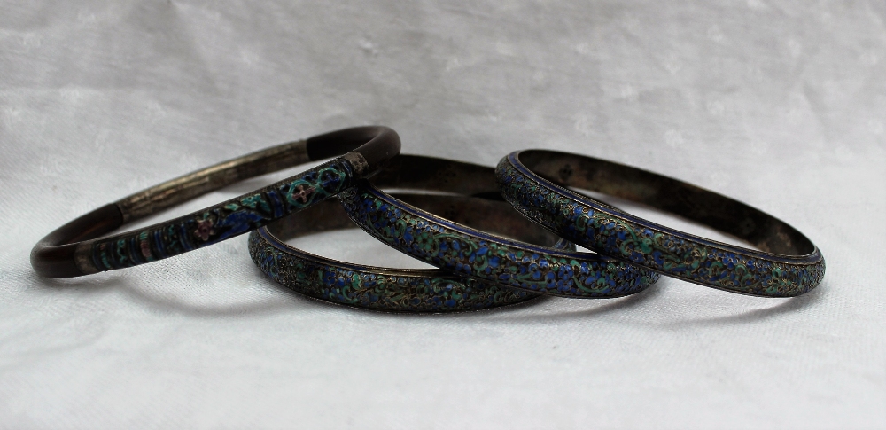 A set of three champleve enamel bangles together with another bangle, a jade brooch, coral brooch, - Image 4 of 5