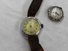 A gentleman's Tymo wristwatch with Arabic numerals and a seconds subsidiary dial on a leather strap