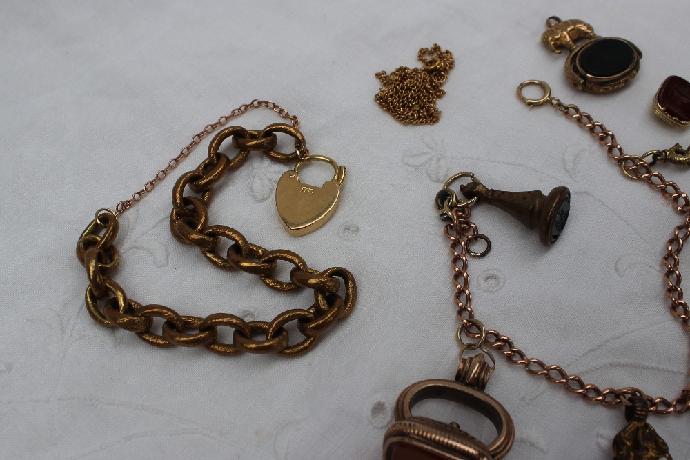 A 9ct yellow gold necklace, together with a 9ct gold bracelet set with hard stone fob seals, - Image 4 of 7