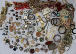 Assorted costume jewellery including bangles, brooches,