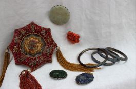 A set of three champleve enamel bangles together with another bangle, a jade brooch, coral brooch,