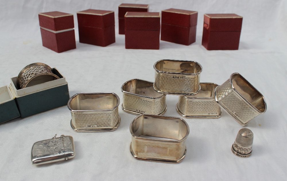 A set of six modern silver napkin rings, Sheffield, 1958,