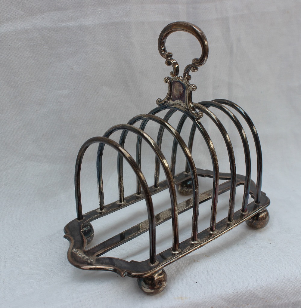 A Victorian silver six division toast rack, Sheffield, 1873, James Thompson, - Image 2 of 5