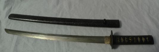 A Japanese Wakizashi short sword with gilt iron mounts, shagreen covered grip,