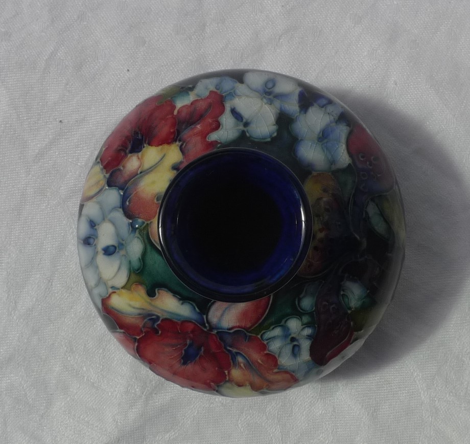 A Moorcroft vase of squat baluster form, decorated with orchids to a blue and green ground, - Image 2 of 3