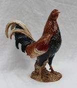 A Beswick model of a game cock, No.