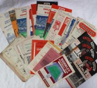 A collection of rugby and football programmes, from the 1950's, 60's, 70's, including Llanelli,