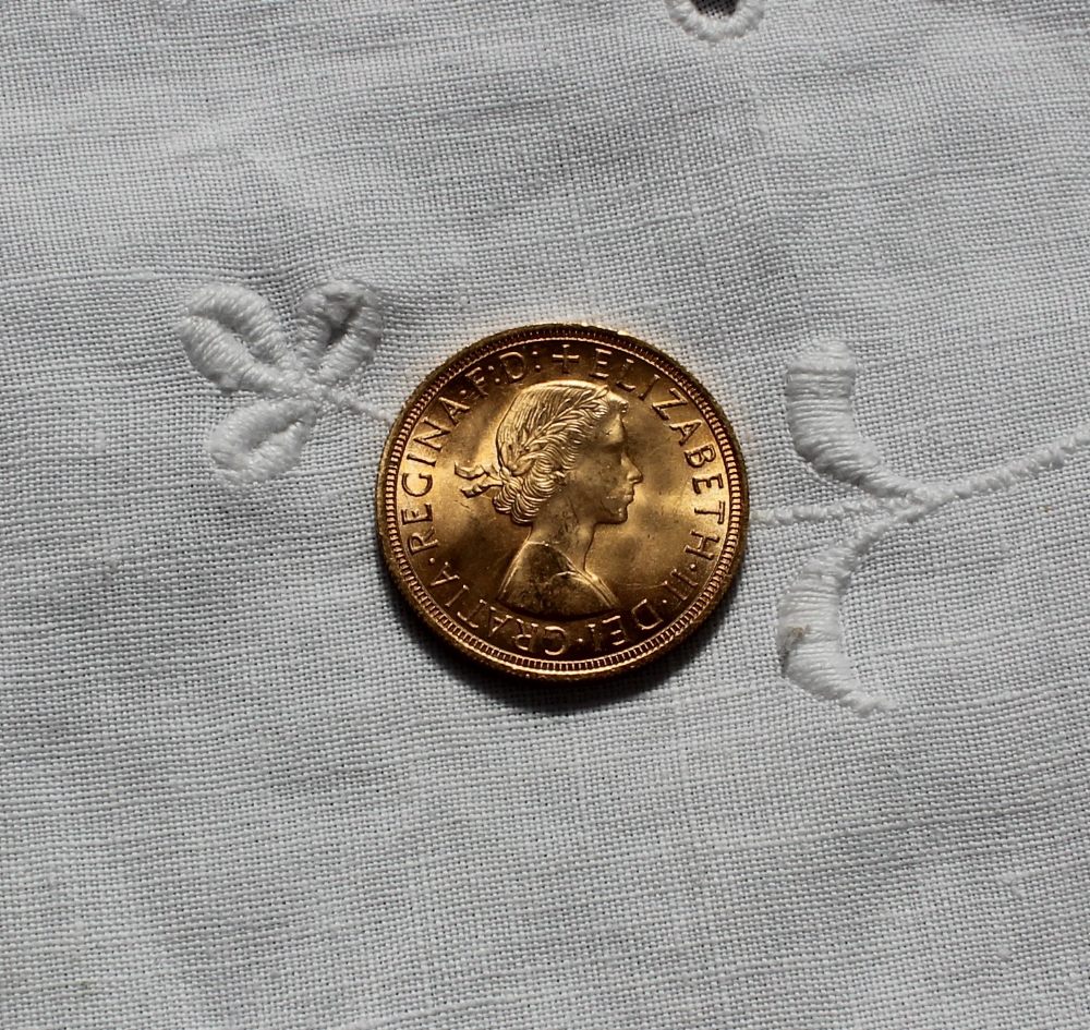 An Elizabeth II gold sovereign dated 1957