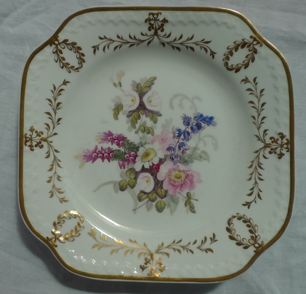 A 19th century English porcelain square plate, the gilt highlighted moulded border,