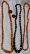 A graduated amber bead necklace, comprising 56 graduated beads from 12mm to 22mm,