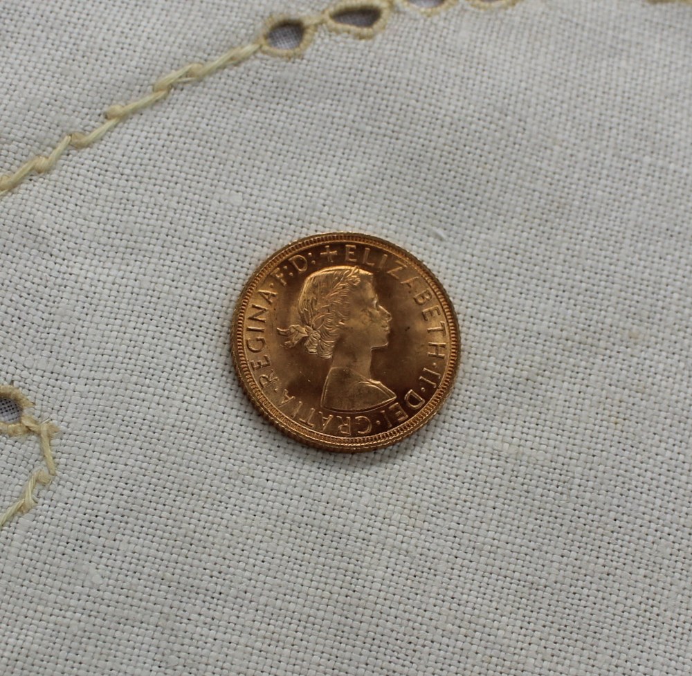 An Elizabeth II gold sovereign dated 1958