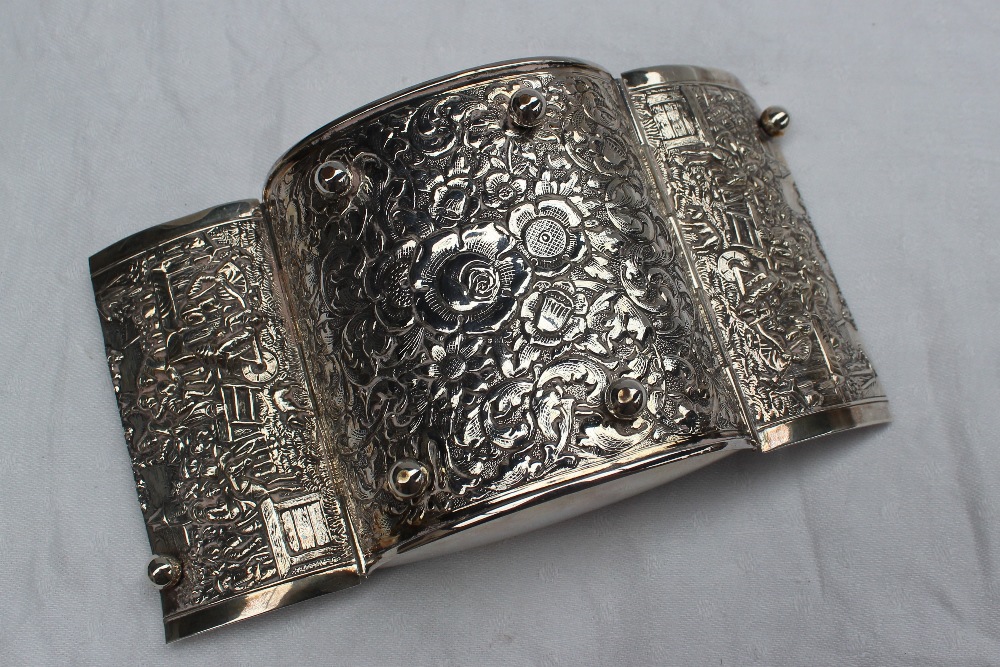 A continental white metal box of pointed oval form with a pair of hinged doors embossed with - Image 4 of 4