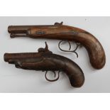 A 19th century percussion cap pistol with an octagonal barrel with ram rod and walnut stock,