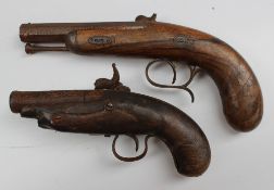 A 19th century percussion cap pistol with an octagonal barrel with ram rod and walnut stock,