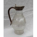 A late Victorian silver topped claret jug,