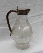 A late Victorian silver topped claret jug,