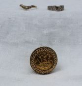 An Elizabeth II gold half sovereign dated 1982 in a 9ct gold ring mount together with a solitaire