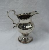 A George III silver cream jug,