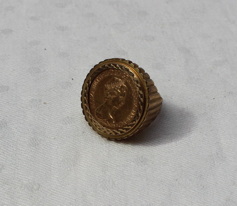 An Elizabeth II gold sovereign, dated 1976, mounted in a 9ct gold ring mount,
