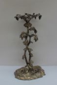 An electroplated table centrepiece in the form of a cherub,