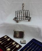 A Victorian silver six division toast rack, Sheffield, 1873, James Thompson,