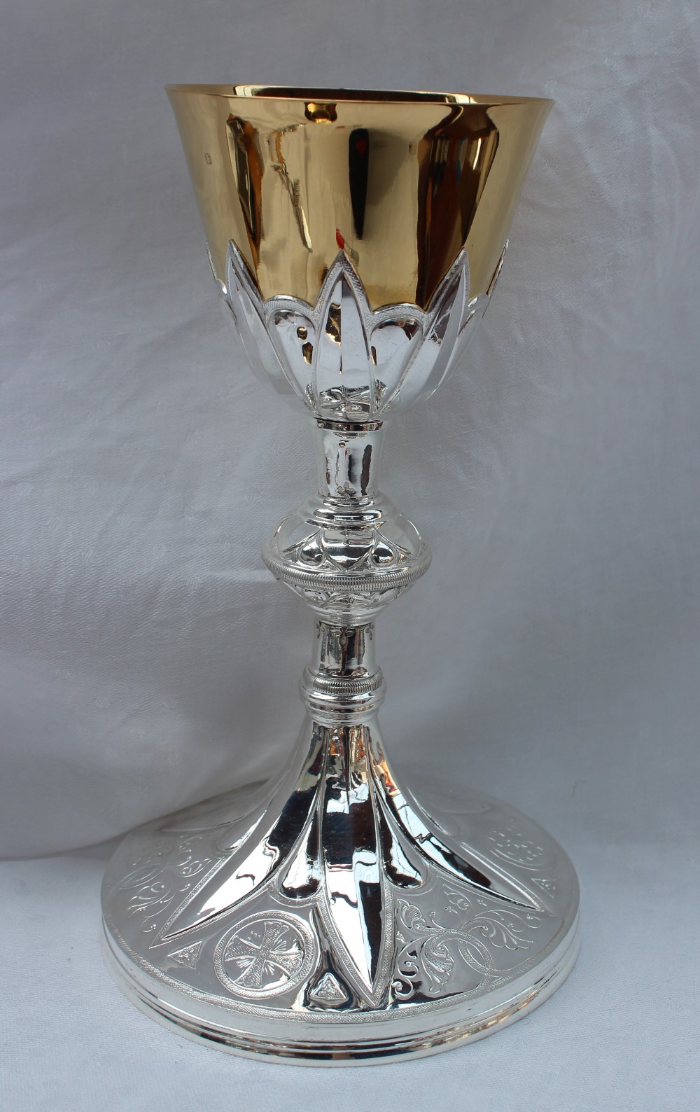 A French white metal and gilt decorated chalice, Minerva mark,