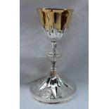 A French white metal and gilt decorated chalice, Minerva mark,