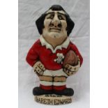 A John Hughes pottery Grogg of Gareth Edwards, holding a rugby in a Welsh jersey, No.