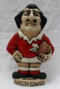 A John Hughes pottery Grogg of Gareth Edwards, holding a rugby in a Welsh jersey, No.