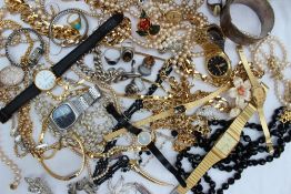 Assorted costume jewellery including watches, dress rings, bracelets, bangles, faux pearls,