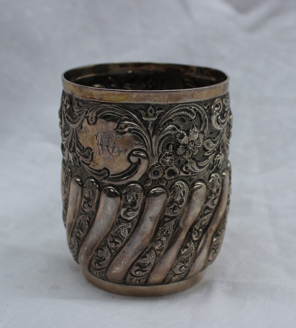 A late Victorian silver christening mug, embossed with flowers, leaves and gadrooning, London, 1896, - Image 2 of 4