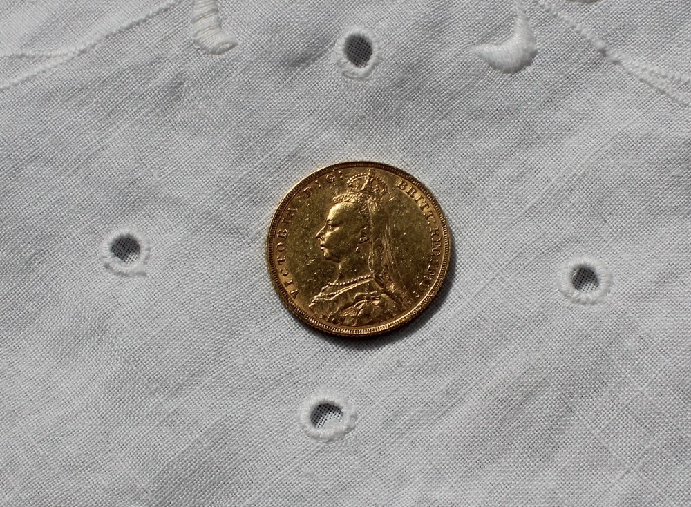 A Victorian gold sovereign dated 1892