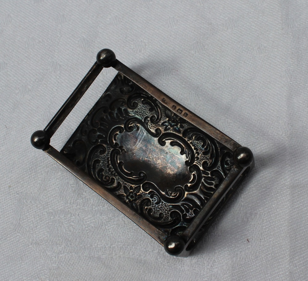 A silver slave bangle together with a silver match box holder, white metal necklaces, - Image 2 of 2