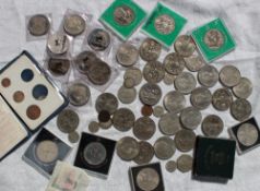 A collection of coins including Churchill crowns, Silver Jubilee crowns,