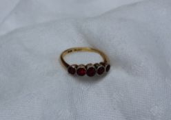 A five stone ruby ring,