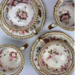 A pair of Daniel porcelain breakfast cups and saucers, together with a pair of tea cups to match,