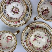 A pair of Daniel porcelain breakfast cups and saucers, together with a pair of tea cups to match,