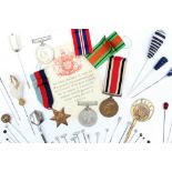 A set of three World War II medals including the War medal, Defence medal and The 1939-1945 Star,
