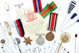 A set of three World War II medals including the War medal, Defence medal and The 1939-1945 Star,